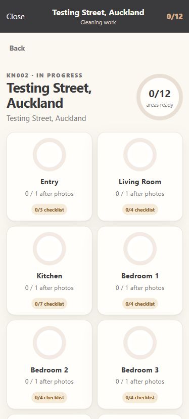 Actual mobile test screen showing Testing Street and room-by-room cleaning progress